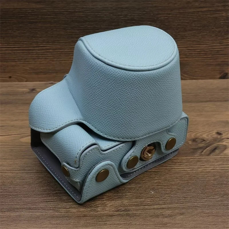 Uniqkart for Canon EOS R50 Camera Case Battery Opening Design Palm Texture Leather Bag with Strap and Small Bag - Baby Blue