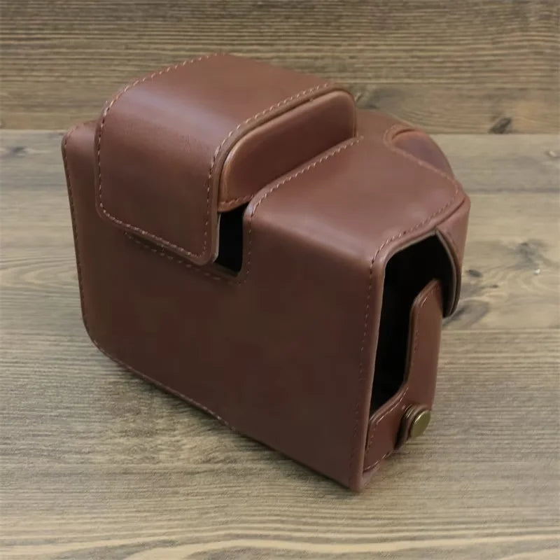 Uniqkart for Canon EOS R50 PU Leather Camera Case Battery Opening Design Camera Cover with Strap and Small Bag - Coffee