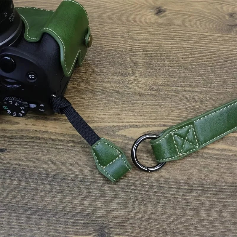 Uniqkart for Canon EOS R50 PU Leather Camera Case Battery Opening Design Camera Cover with Strap and Small Bag - Coffee