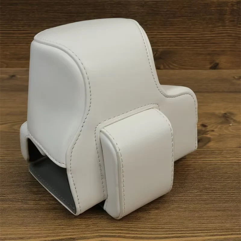 Uniqkart for Canon EOS R50 PU Leather Camera Case Battery Opening Design Camera Cover with Strap and Small Bag - White