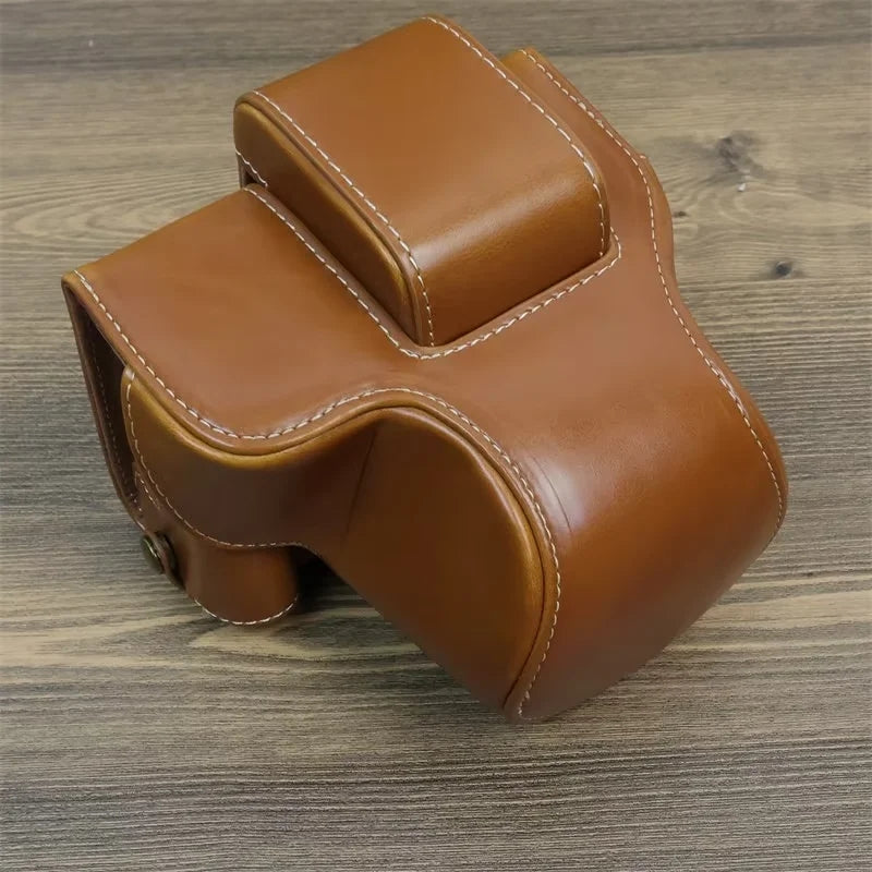 Uniqkart for Canon EOS R50 PU Leather Camera Case Battery Opening Design Camera Cover with Strap and Small Bag - Brown