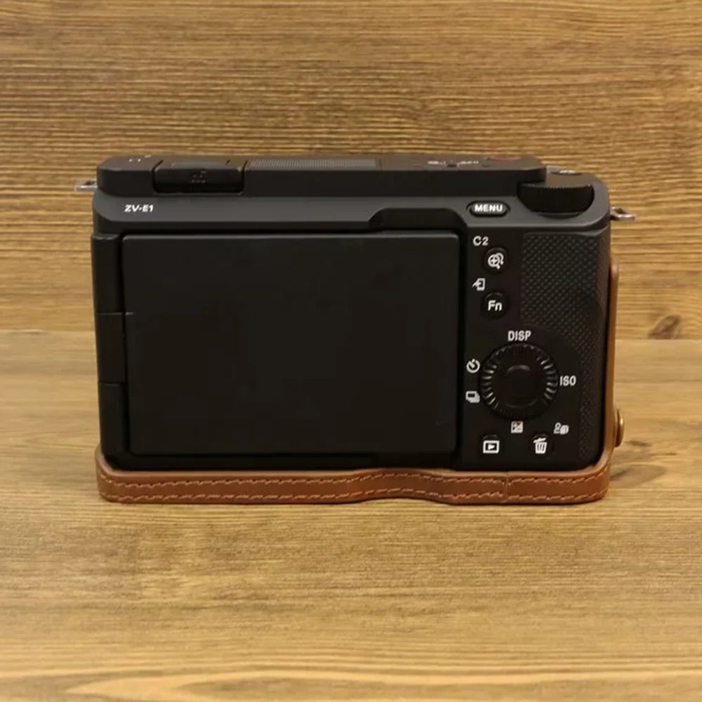 Uniqkart for Sony ZV-E1 PU Leather Camera Bottom Case Half Body Anti-scratch Cover with Battery Opening - Coffee