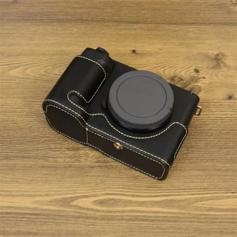 Uniqkart for Sony ZV-E1 Battery Opening Design PU Leather Camera Bottom Cover Half Body Case with Hand Strap - Black
