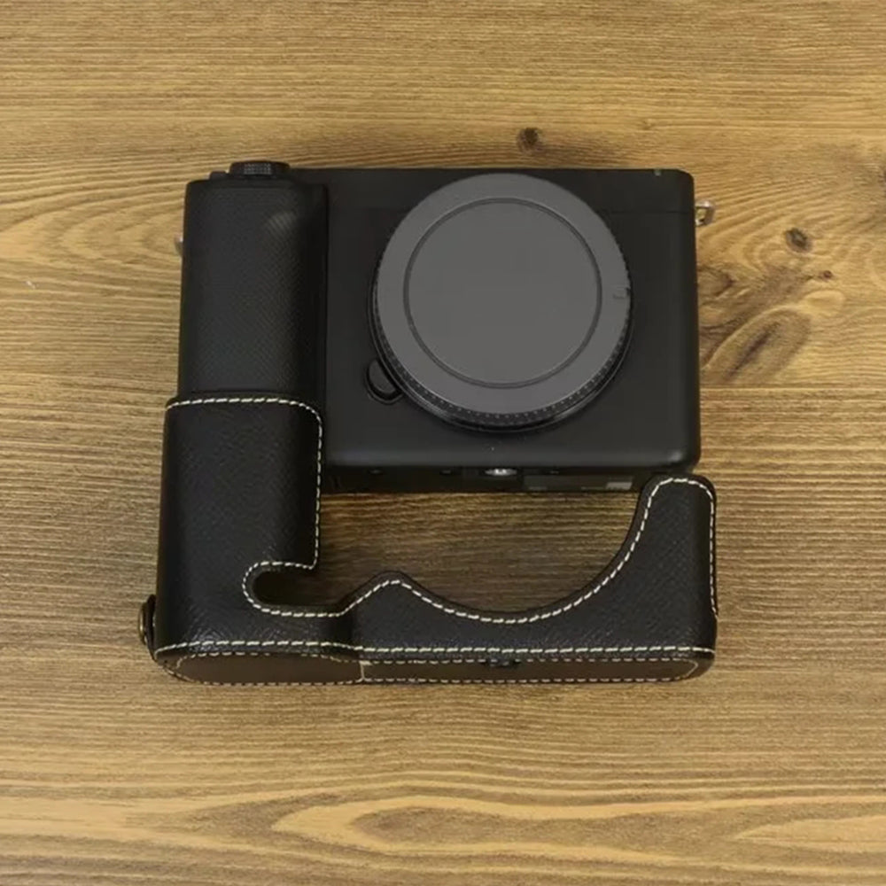Uniqkart for Sony ZV-E1 Battery Opening Design PU Leather Camera Bottom Cover Half Body Case with Hand Strap - Black