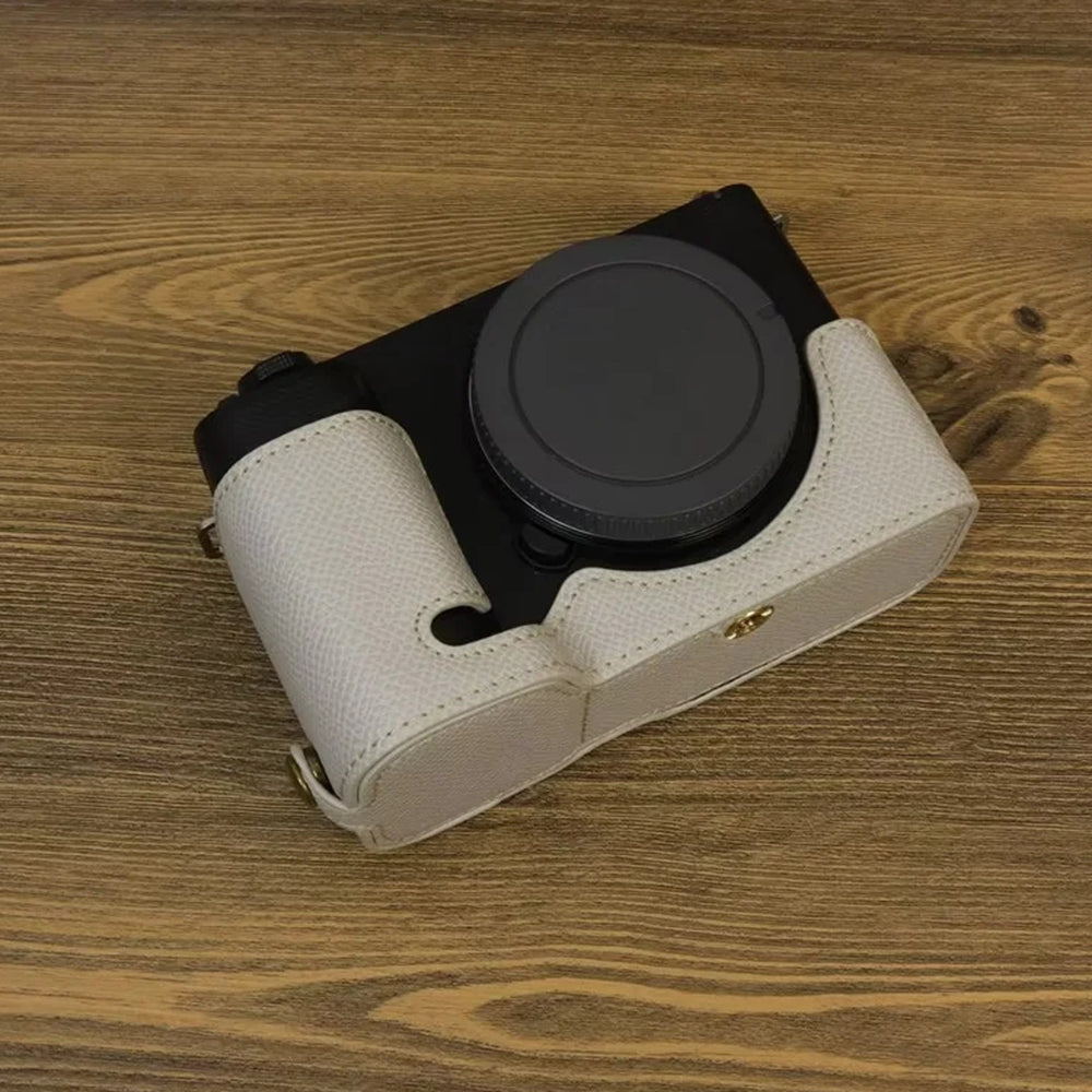 Uniqkart for Sony ZV-E1 Battery Opening Design PU Leather Camera Bottom Cover Half Body Case with Hand Strap - Grey White