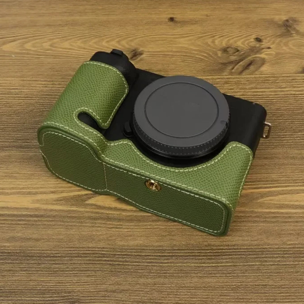 Uniqkart for Sony ZV-E1 Battery Opening Design PU Leather Camera Bottom Cover Half Body Case with Hand Strap - Green