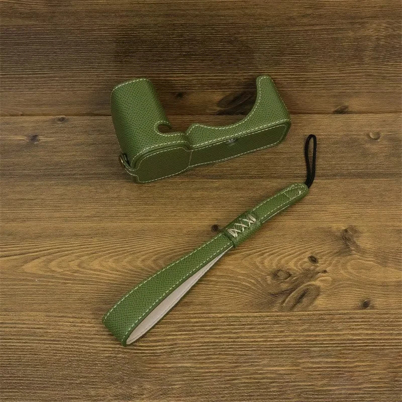 Uniqkart for Sony ZV-E1 Battery Opening Design PU Leather Camera Bottom Cover Half Body Case with Hand Strap - Green