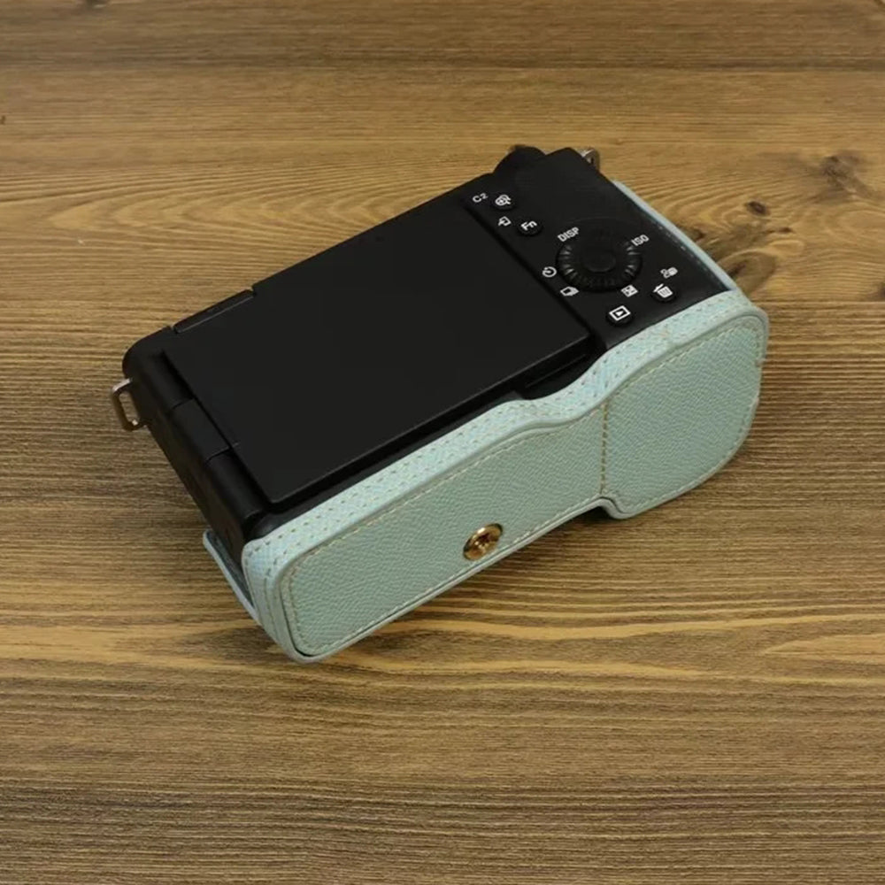 Uniqkart for Sony ZV-E1 Battery Opening Design PU Leather Camera Bottom Cover Half Body Case with Hand Strap - Baby Blue