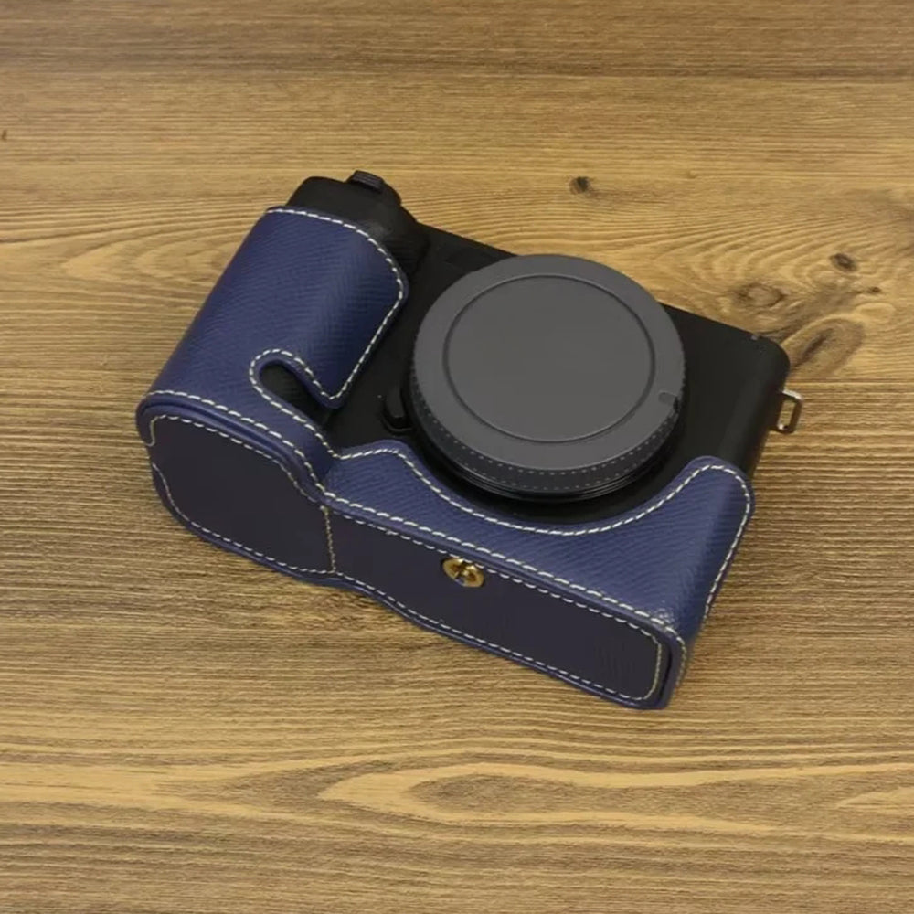 Uniqkart for Sony ZV-E1 Battery Opening Design PU Leather Camera Bottom Cover Half Body Case with Hand Strap - Dark Blue