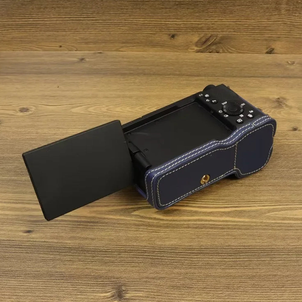 Uniqkart for Sony ZV-E1 Battery Opening Design PU Leather Camera Bottom Cover Half Body Case with Hand Strap - Dark Blue