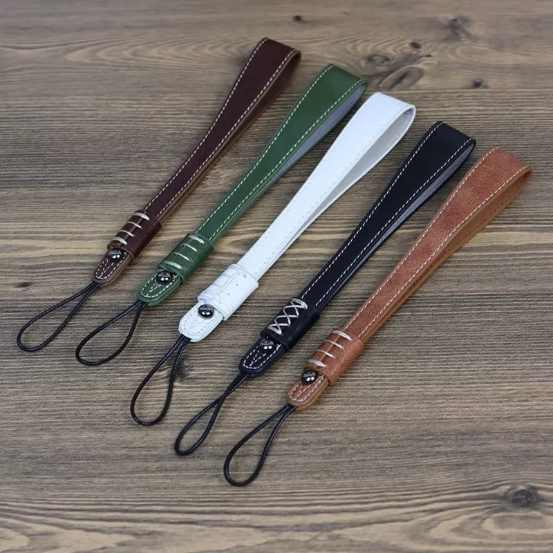 Uniqkart for Fuji / Canon / Nikon / Panasonic DSLR Camera 2mm Connector PU Leather Wrist Strap Hand Grip Rope - Brown