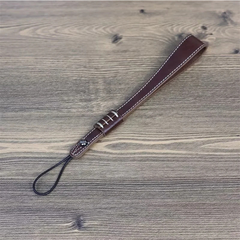 Uniqkart for Fuji / Canon / Nikon / Panasonic DSLR Camera 2mm Connector PU Leather Wrist Strap Hand Grip Rope - Coffee