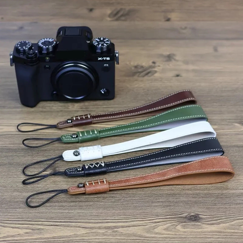Uniqkart for Fuji / Canon / Nikon / Panasonic DSLR Camera 2mm Connector PU Leather Wrist Strap Hand Grip Rope - Coffee