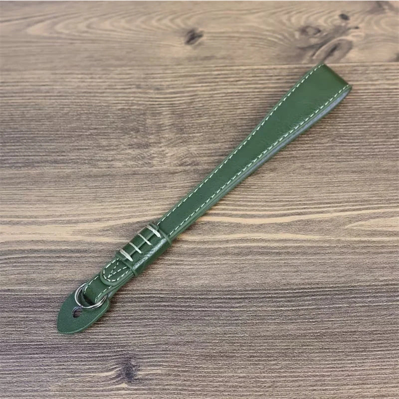 Uniqkart for Fujifilm xt5 / xh2 / xt4 / xs10 / xt30II Camera PU Leather Hand Strap SLR Camera Anti-lost Wrist Rope - Green