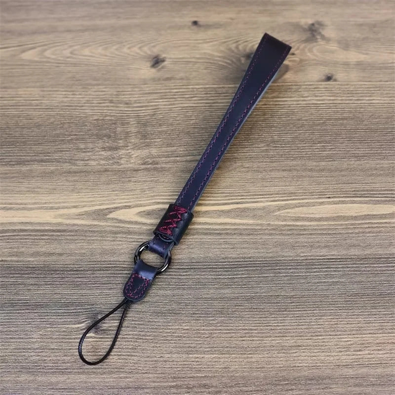 Uniqkart for Fujifilm XT4 / A7r5 / A7M4 / X100v / XH2 Camera Carrying Strap Top Layer Cowhide Leather Quick Release Hand Rope - Black