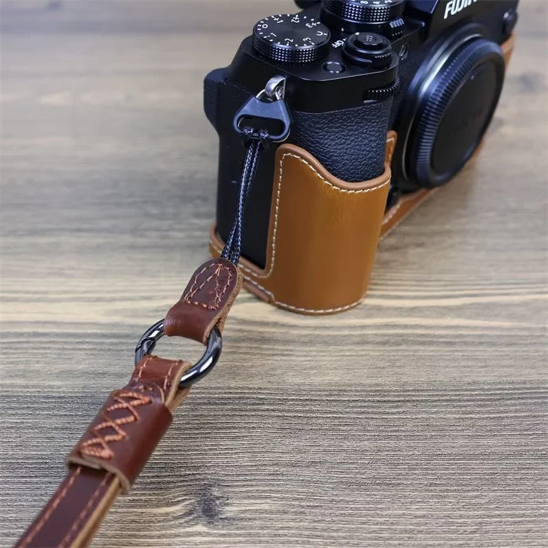 Uniqkart for Fujifilm XT4 / A7r5 / A7M4 / X100v / XH2 Camera Carrying Strap Top Layer Cowhide Leather Quick Release Hand Rope - Coffee
