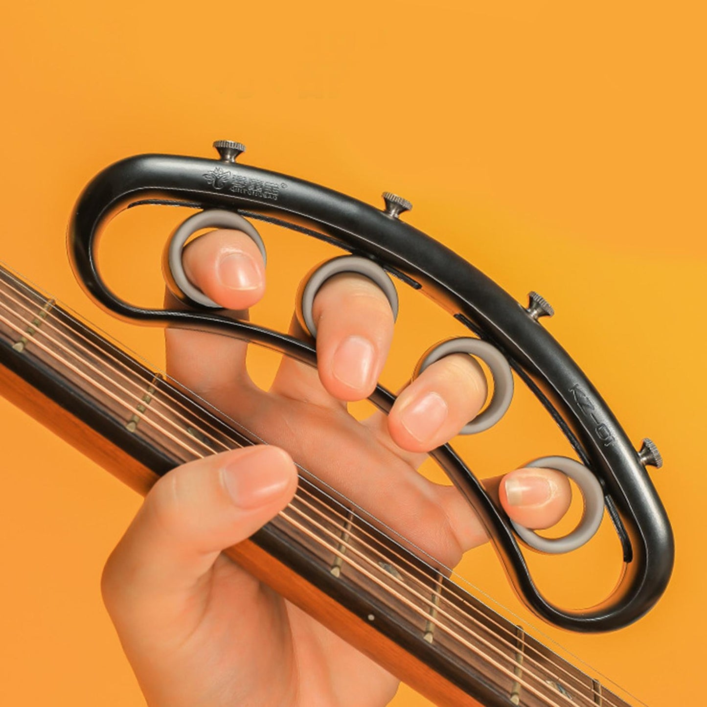 Guitar Finger Exerciser Guitar Piano Trainer Finger Speed Practice Orange