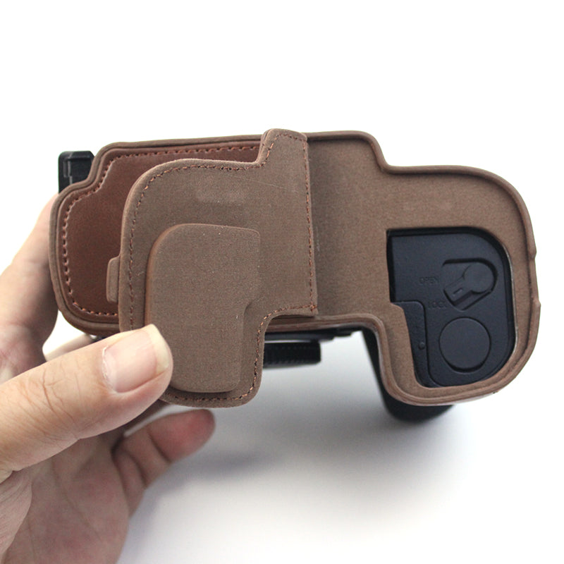 Uniqkart for Panasonic LUMIX GH6/DC-GH6GK Fashionable PU Leather Camera Bottom Case Battery Opening Design Protective Half Body Cover - Coffee