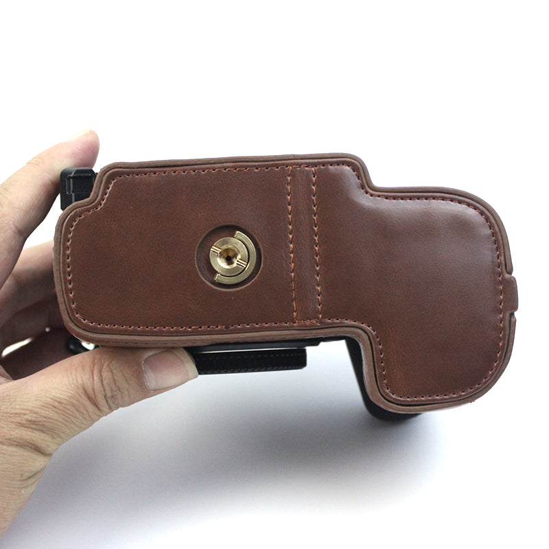 Uniqkart for Panasonic LUMIX GH6/DC-GH6GK Fashionable PU Leather Camera Bottom Case Battery Opening Design Protective Half Body Cover - Coffee