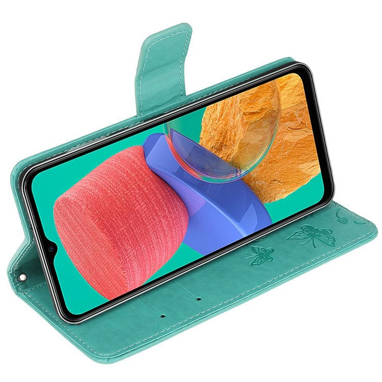 For Samsung Galaxy M33 5G (India Version) PU Leather Magnetic Flip Cover Butterfly Flower Imprinted Stand Hand Strap Wallet Purse Case - Green