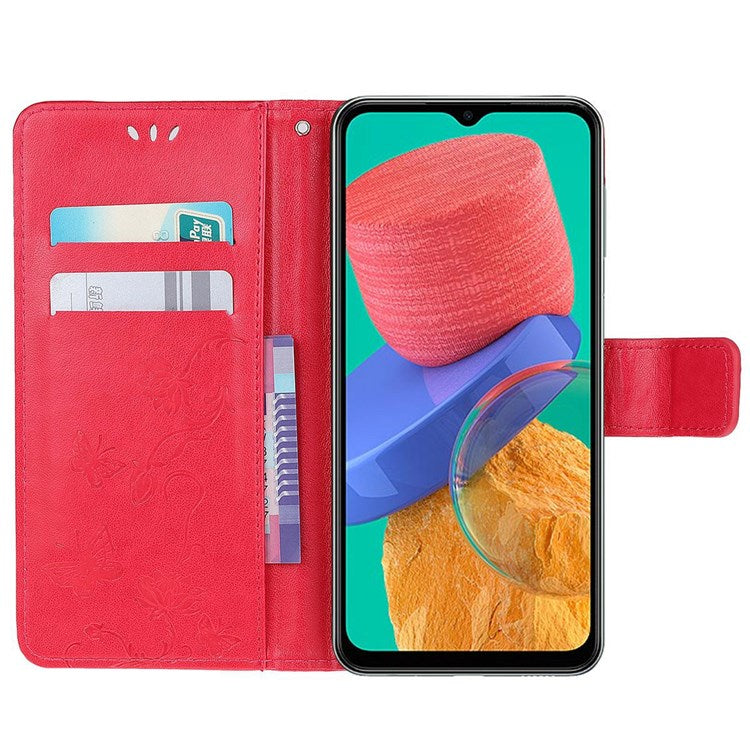 For Samsung Galaxy M33 5G (India Version) PU Leather Magnetic Flip Cover Butterfly Flower Imprinted Stand Hand Strap Wallet Purse Case - Red