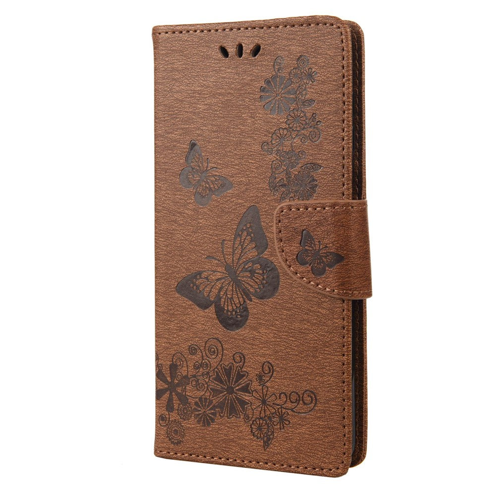 For Samsung Galaxy M33 5G (Global Version) Wallet Case Butterfly Flower Imprinted PU Leather Stand Flip Cover with Hand Strap - Brown