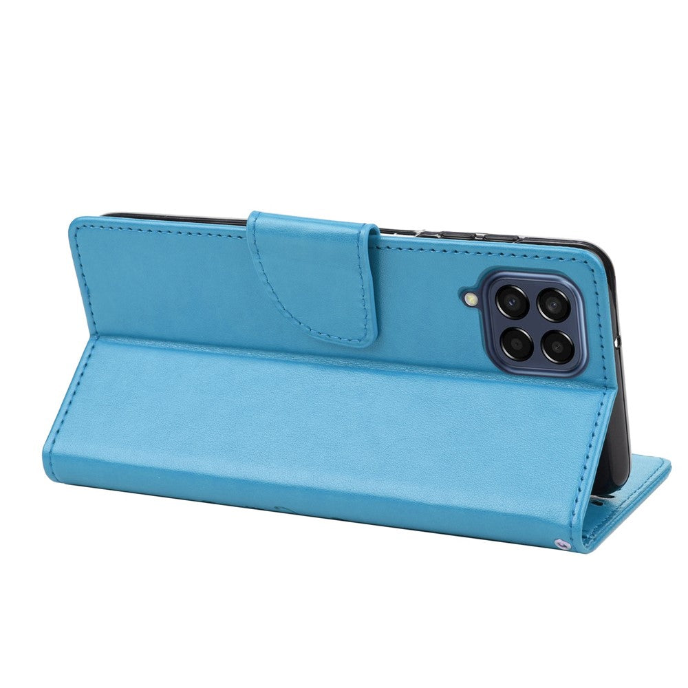 For Samsung Galaxy M33 5G (Global Version) Butterfly Flower Imprinted Wallet Case, PU Leather Foldable Stand Flip Cover with Hand Strap - Blue
