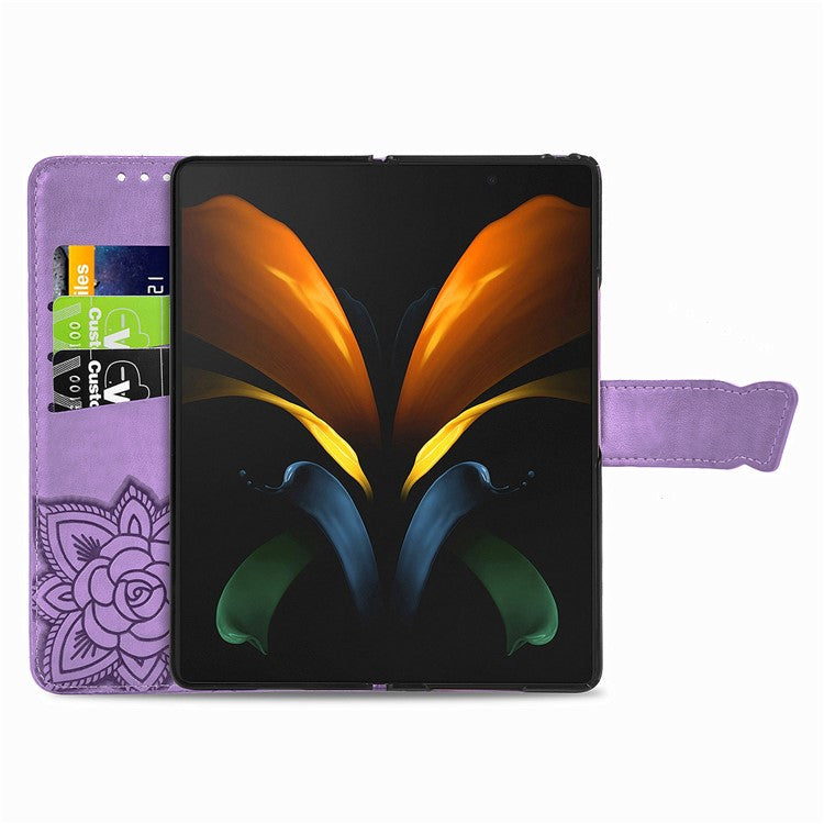 For Samsung Galaxy Z Fold4 5G Drop-proof Flip Cover PU Leather Book Wallet Case Imprinted Butterfly Pattern Stand Magnetic Clasp Phone Shell with Wrist Strap - Light Purple