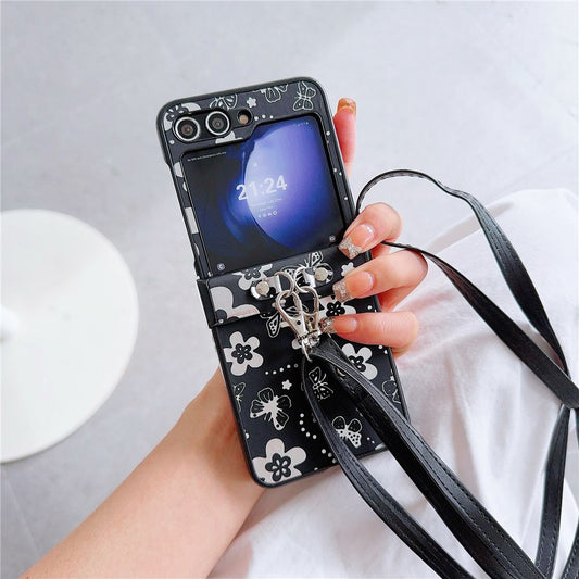 For Samsung Galaxy Z Flip7 FE 5G / Z Flip6 5G Butterfly and Flower Pattern PU Leather Coated PC Phone Cover with Crossbody Strap - Black