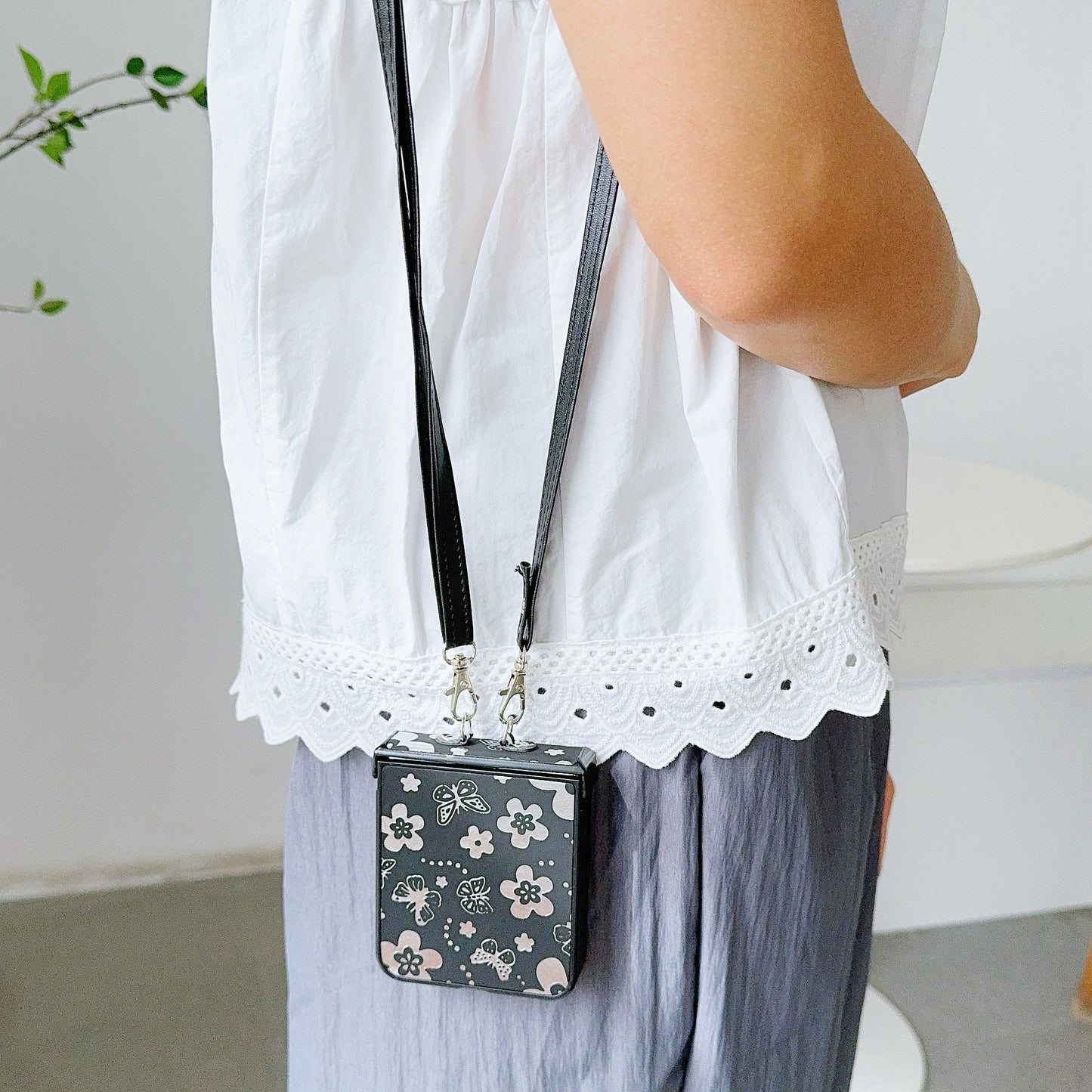 For Samsung Galaxy Z Flip6 5G Butterfly and Flower Pattern PU Leather Coated PC Phone Cover with Crossbody Strap - Black