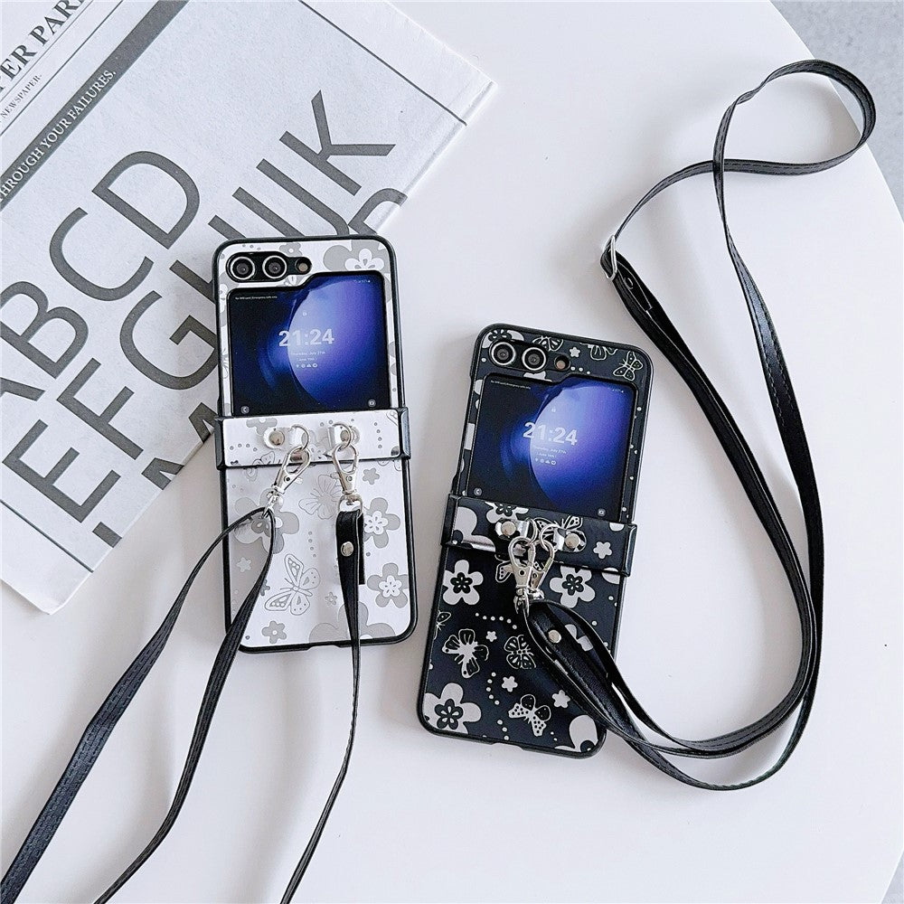 For Samsung Galaxy Z Flip7 FE 5G / Z Flip6 5G Butterfly and Flower Pattern PU Leather Coated PC Phone Cover with Crossbody Strap - Black