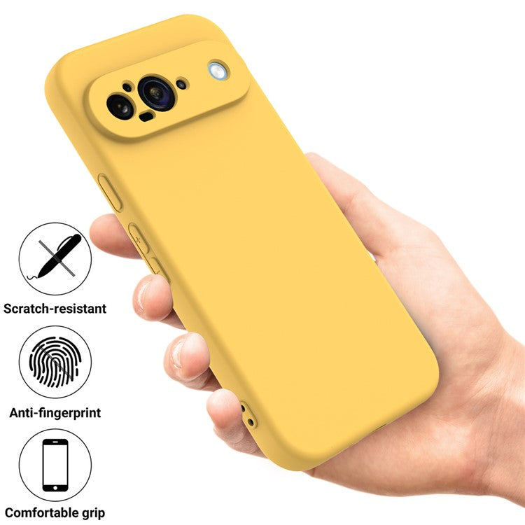 For Google Pixel 9 Case Liquid Silicone Shockproof Phone Cover with Hand Strap - Yellow