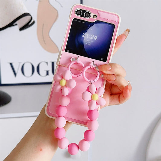 For Samsung Galaxy Z Flip7 FE 5G / Z Flip6 5G Case Skin-Touch Leather+PC Phone Cover with Beaded Wrist Strap - Pink