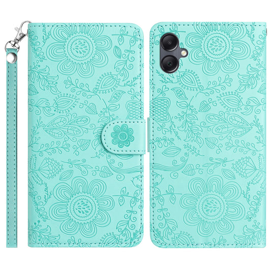 For Samsung Galaxy A06 Case Flower Imprint Leather Flip Wallet Phone Cover with Wrist Strap - Light Green