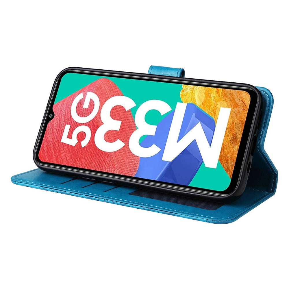 For Samsung Galaxy M33 5G (Global Version) Shockproof PU Leather Phone Case Magnetic Closure Sunflower Imprinted Stand Flip Wallet Cover with Strap - Blue