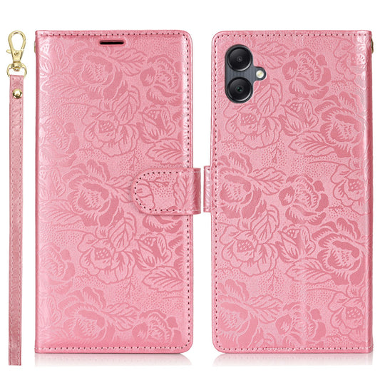 For Samsung Galaxy A06 Case with Hand Strap Flower Imprint Leather Wallet Phone Cover - Rose Gold