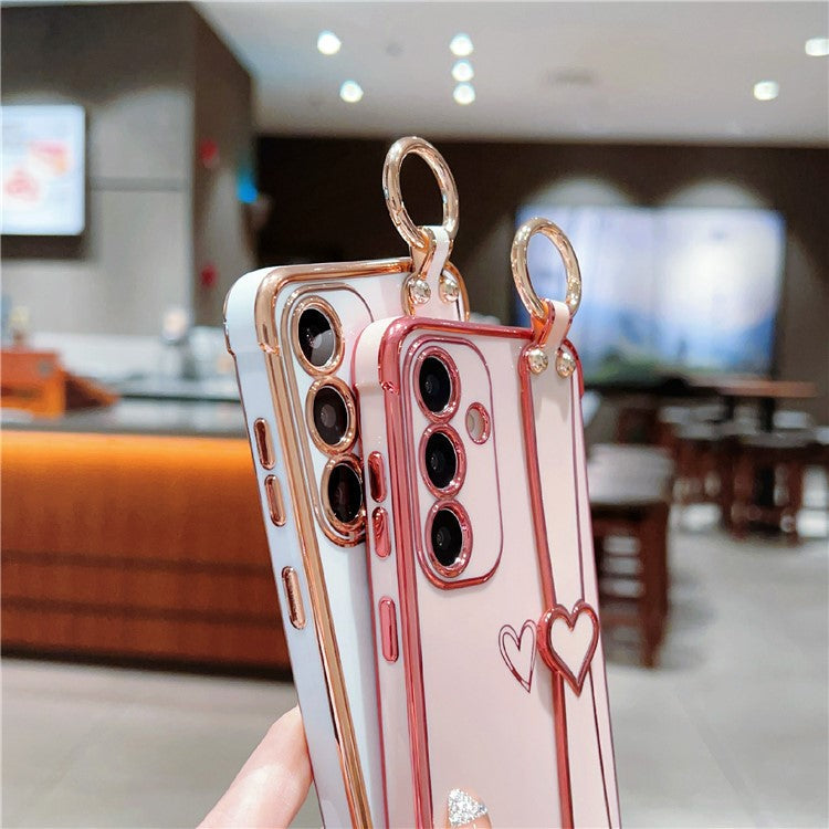 For Samsung Galaxy A16 5G / A16 4G Case Electroplated Heart Pattern TPU Phone Back Cover with Wristband Kickstand - Black