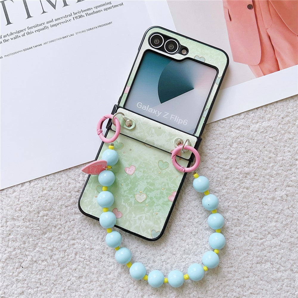 For Samsung Galaxy Z Flip7 FE 5G / Z Flip6 5G Case Anti Drop PC + PU Phone Back Cover with Beaded Strap Pattern Design - Green Heart