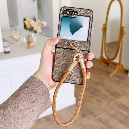 For Samsung Galaxy Z Flip7 FE 5G / Z Flip6 5G Case Litchi Texture PU + PC Phone Back Cover with Strap - Brown