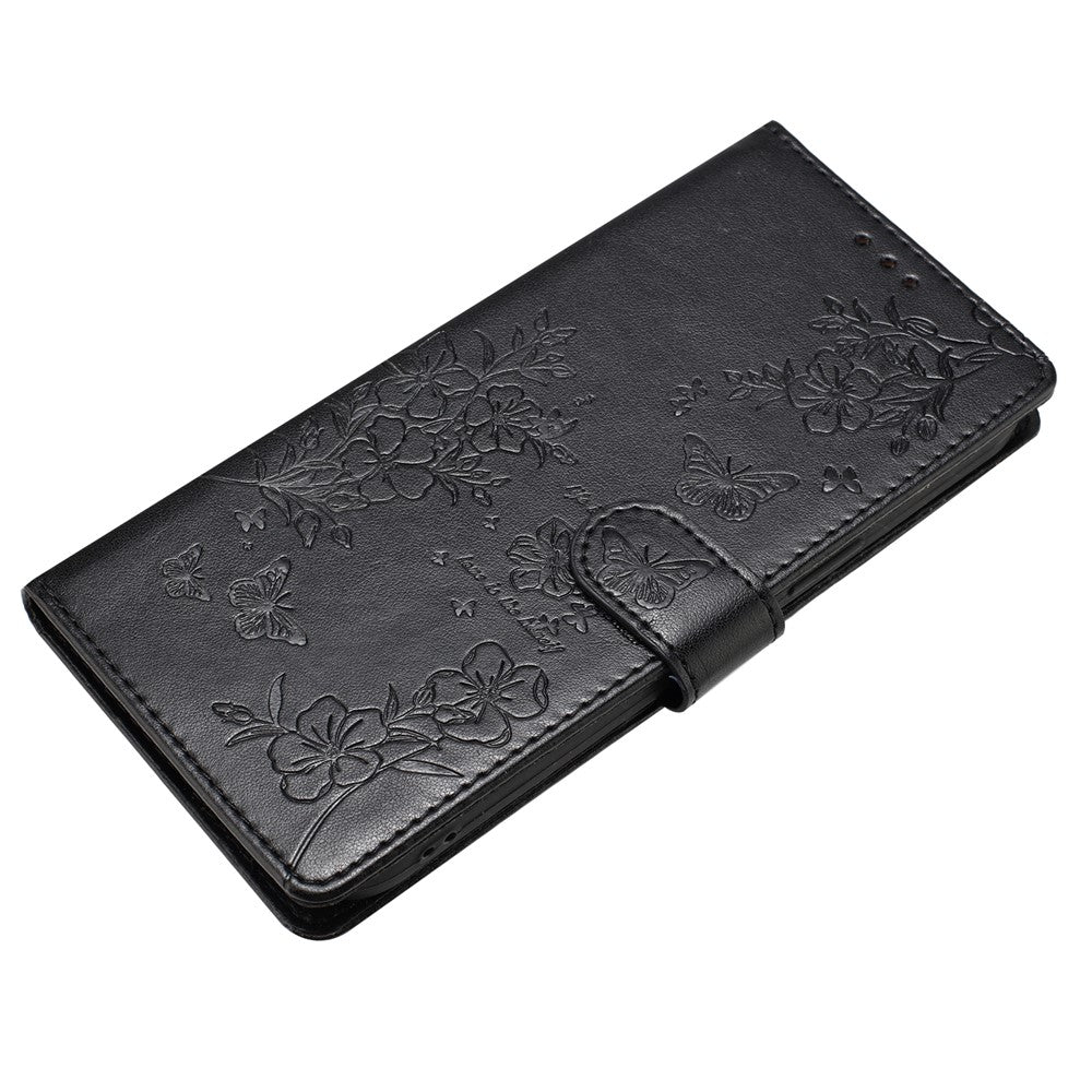 For iPhone 17 Pro Max Wallet Phone Case Butterfly Floral Imprint Leather Flip Cover with Strap - Black