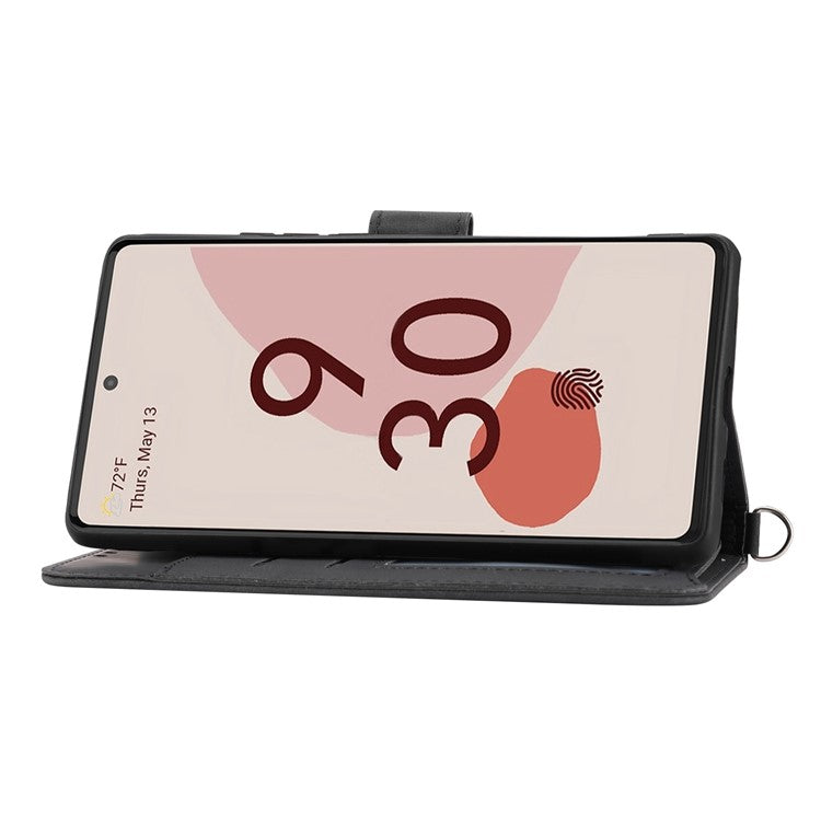 For Google Pixel 7 5G Imprinted Flowers Phone Case Skin-Touch PU Leather Stand Multiple Card Slots Wallet Cover with Wrist Strap and Shoulder Strap - Black