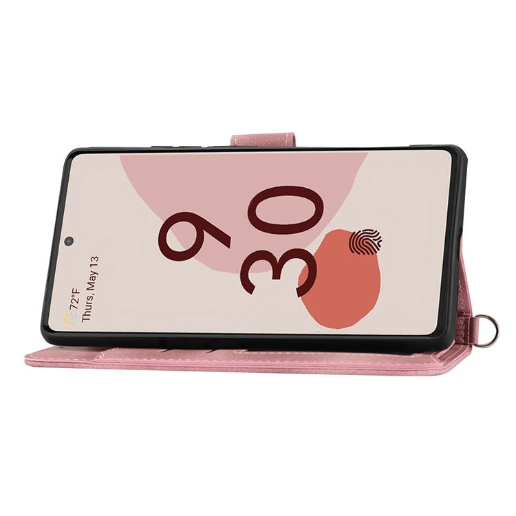 For Google Pixel 7 5G Imprinted Flowers Phone Case Skin-Touch PU Leather Stand Multiple Card Slots Wallet Cover with Wrist Strap and Shoulder Strap - Pink
