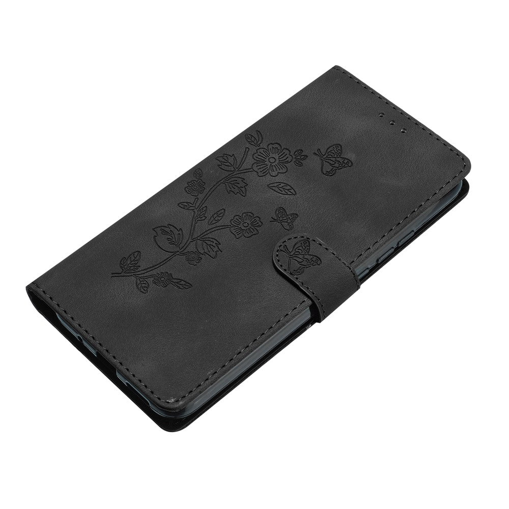 For iPhone 17 Pro Max Case Leather Imprinted Flower Phone Cover Wallet with Wrist Strap - Black