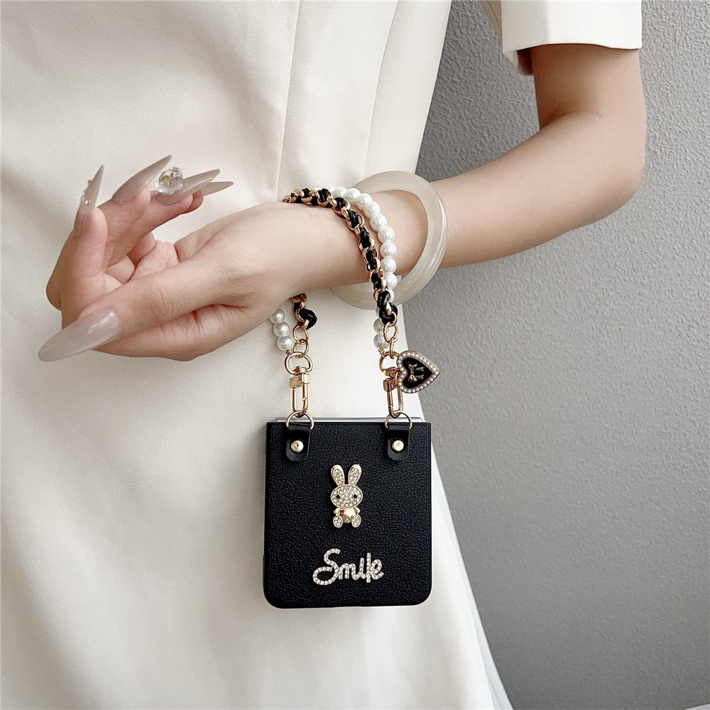 For Samsung Galaxy Z Flip7 5G Case Smile Rabbit PU + PC Phone Cover with Wrist Strap - Litchi Texture