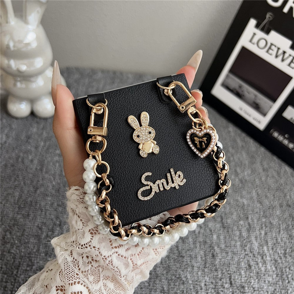 For Samsung Galaxy Z Flip7 5G Case Smile Rabbit PU + PC Phone Cover with Wrist Strap - Litchi Texture