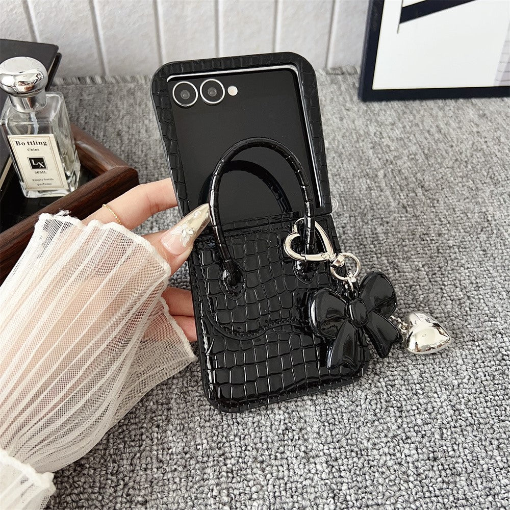 For Samsung Galaxy Z Flip7 5G Case Handbag Crocodile Texture Leather + PC Phone Cover with Bow Heart Pendant - Black