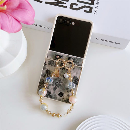 For Samsung Galaxy Z Flip7 5G Case Glitter Flower TPU + PC Phone Cover with Beaded Wrist Strap - Black