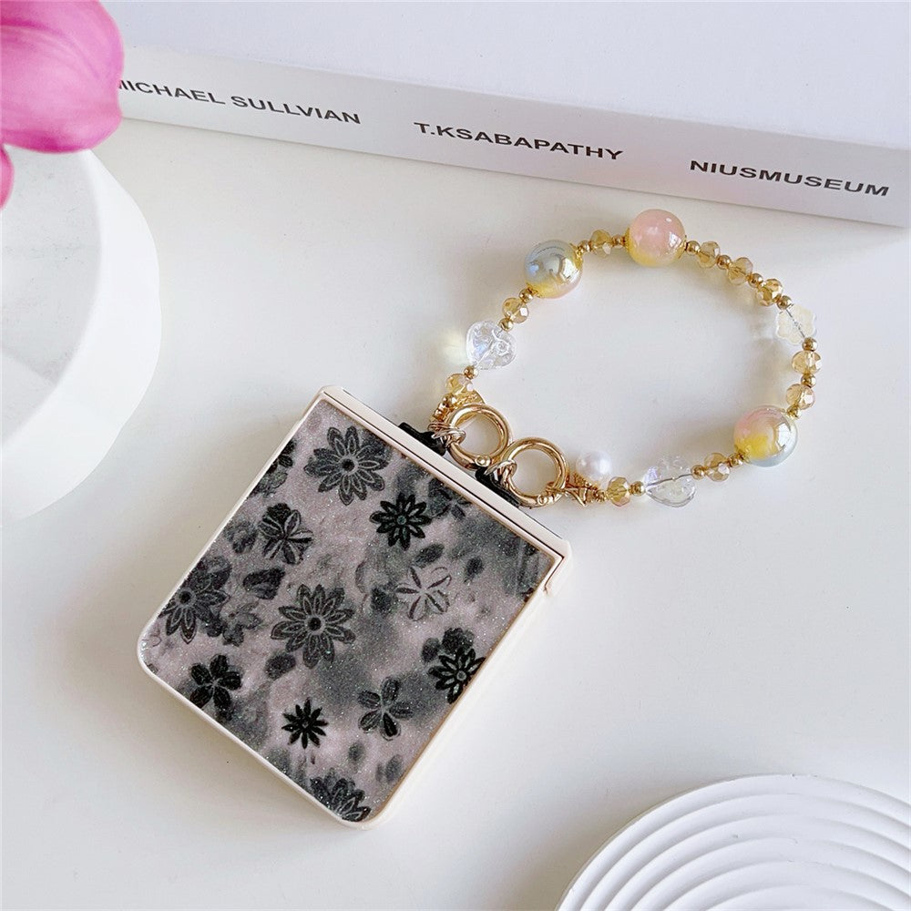 For Samsung Galaxy Z Flip7 5G Case Glitter Flower TPU + PC Phone Cover with Beaded Wrist Strap - Black