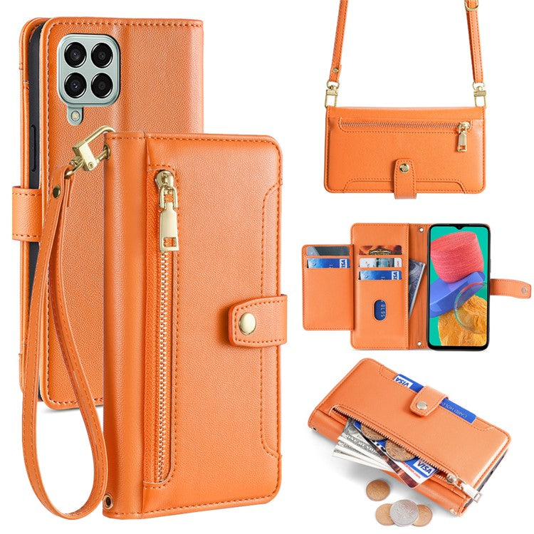 For Samsung Galaxy M33 5G (Global Version) Cell Phone Case Textured Leather Stand Cover with 2 Straps - Orange