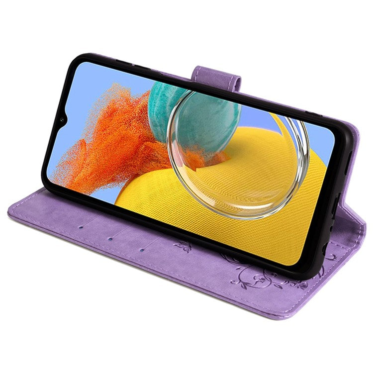 For Samsung Galaxy M14 5G Phone Case Butterfly Flower Imprinted Leather Flip Cover with Wrist Strap - Purple